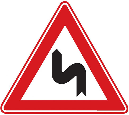 Sola Tehlikeli Devamlı Virajlar Levhası İşareti